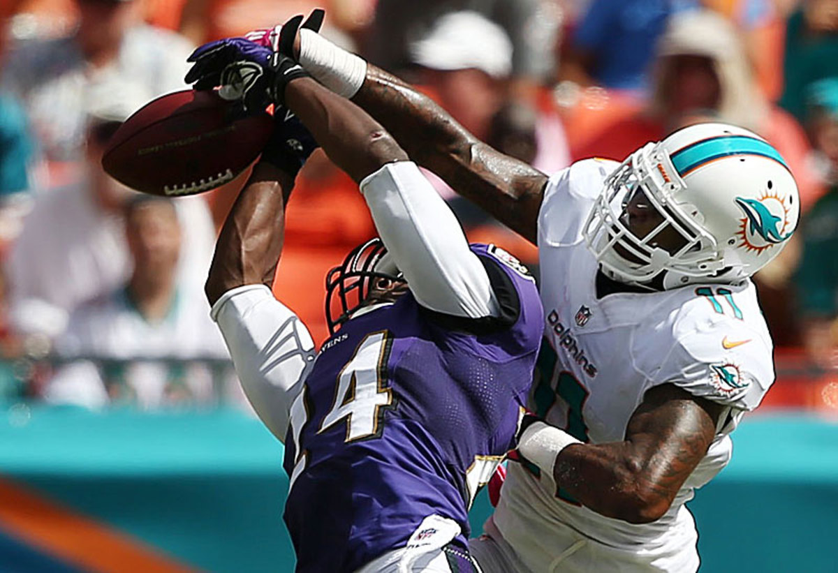 Mike Wallace has been a major disappointment for the Dolphins after signing one of free agency's richest deals. (J Pat Carter/AP)