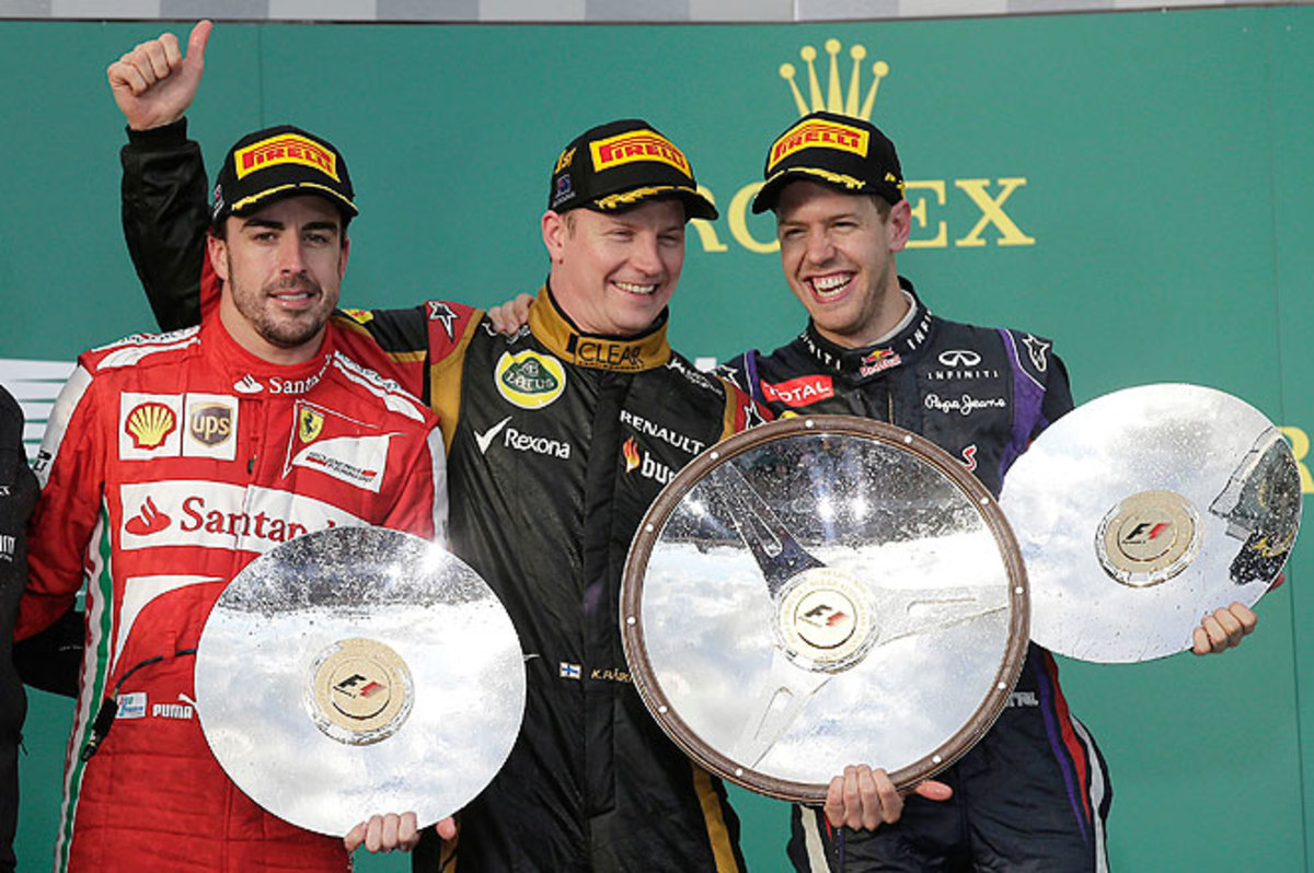 Kimi Raikkonen (center) took the season opener over Fernando Alonso (left) and Sebastian Vettel.