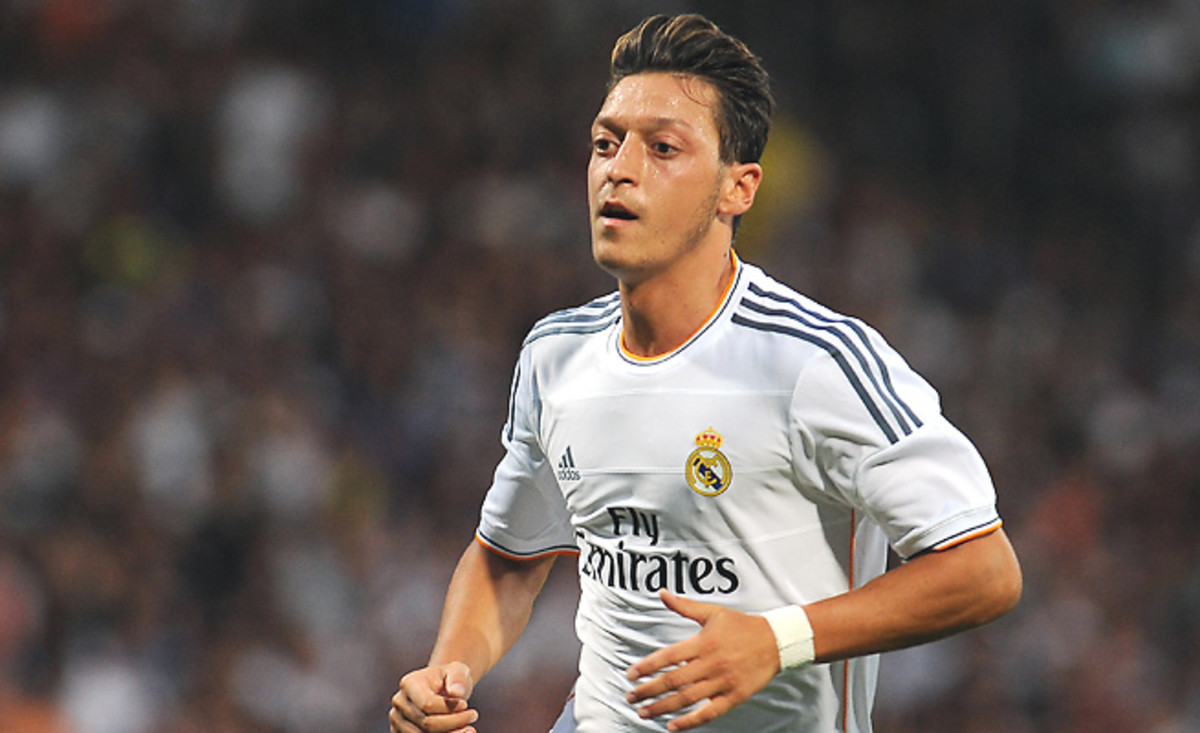 Midfielder Mesut Ozil's 50 million euro transfer fee is easily a club record for Arsenal.