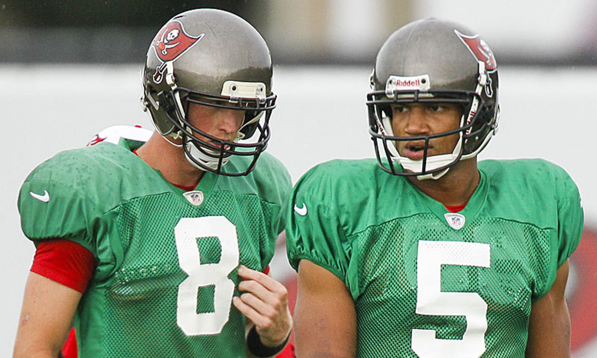 After a number of mini controversies already in the season, Josh Freeman (right) will be taking a seat for Mike Glennon. (Will Vragovic/Tampa Bay Times/ZUMAPRESS.com)