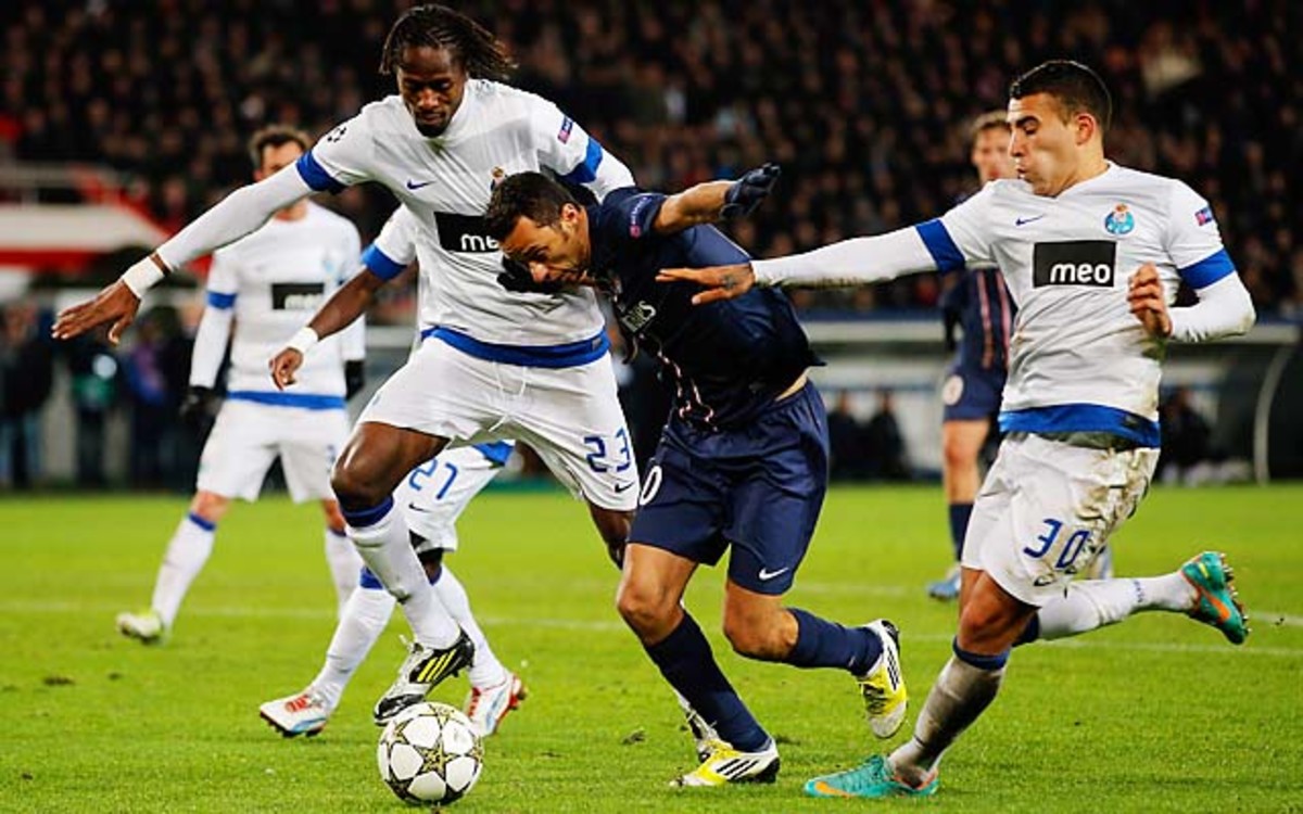Nene (center) battles for the ball in a Champions League match with FC Porto in December.