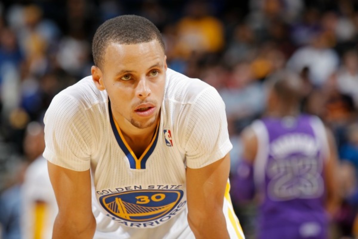 Stephen Curry suffered a bruised left ankle bone against the Timberwolves. (Rocky Widner/NBAE via Getty Images)