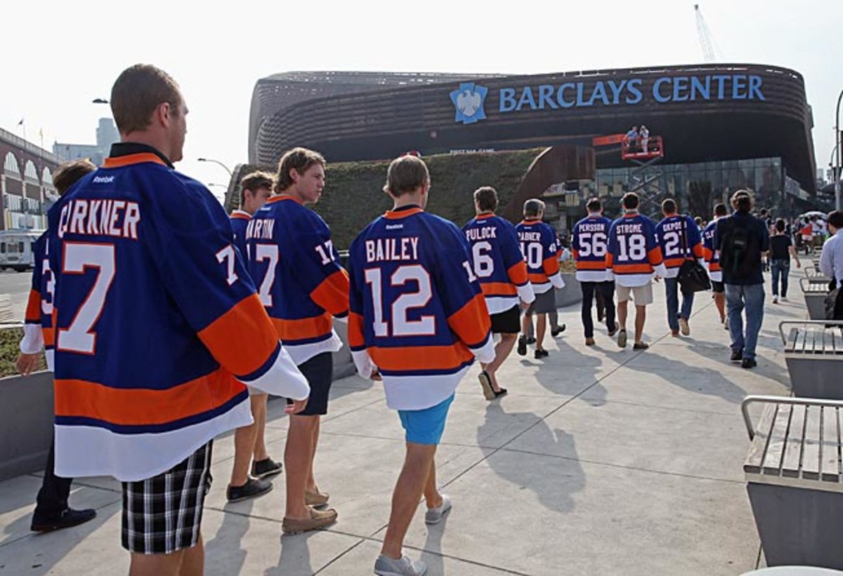 The Islanders head for their new barn after riding a Long Island Railroad train into Brooklyn.