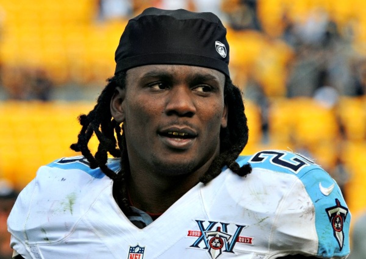 Chris Johnson is scheduled to earn a base salary of $7 million in 2014. (George Gojkovich/Getty Images)