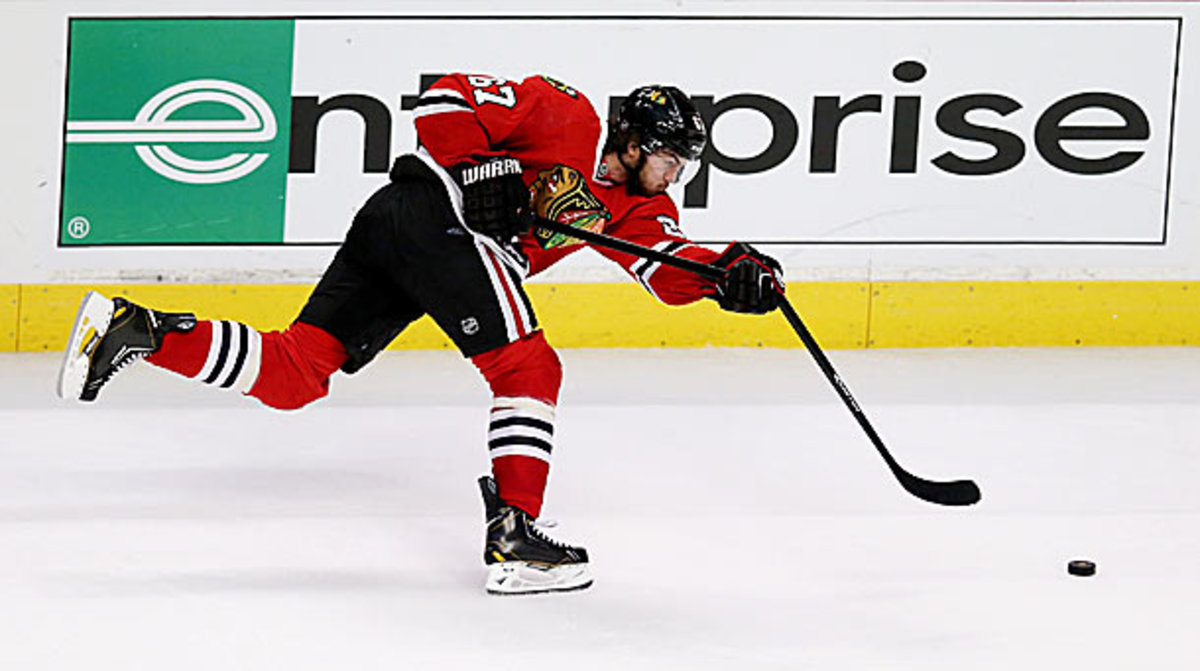 Michael Frolik breaks his stick