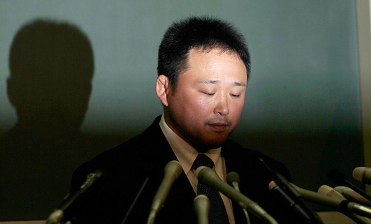 Ryuji Sonoda answers questions during a January press conference. Sonoda was accused of harassing members of the Japanese women's judo team and subsequently resigned.