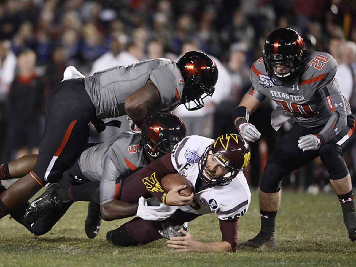 Arizona State QB Taylor Kelly struggled all night against the Texas Tech defense. (Donald Miralle/Getty Images)