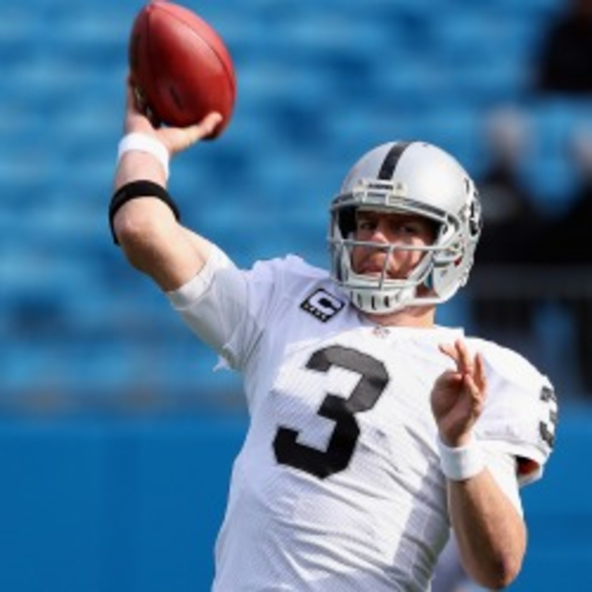 Raiders quarterback Carson Palmer is due $13 million in 2013. (Streeter Lecka/Getty Images)