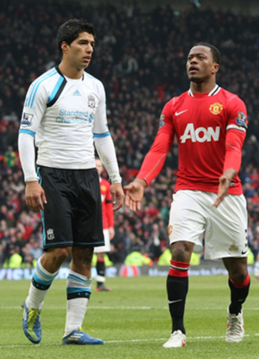 Luis Suarez got in hot water for a race row involving Manchester United's Patrice Evra, right, in October 2011.