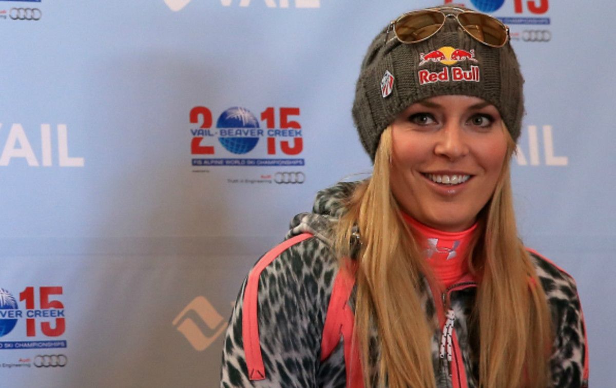 Lindsey Vonn has an Olympic Downhill gold medal to go with her 4 overall World Cup championships. (Doug Pensinger/Getty Images)