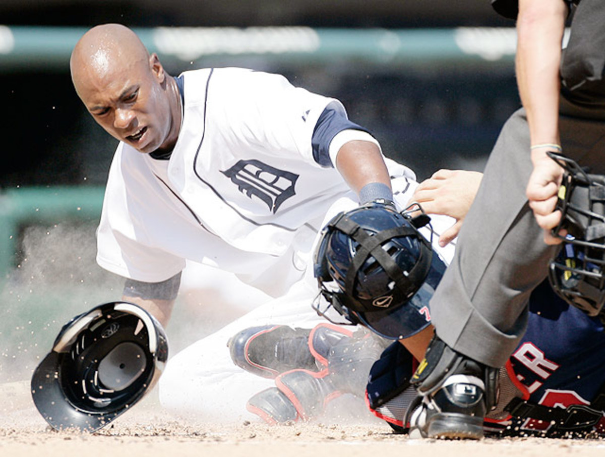 Austin Jackson (left), Joe Mauer