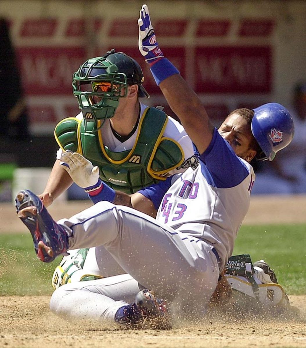 Raul Mondesi (right), Greg Myers