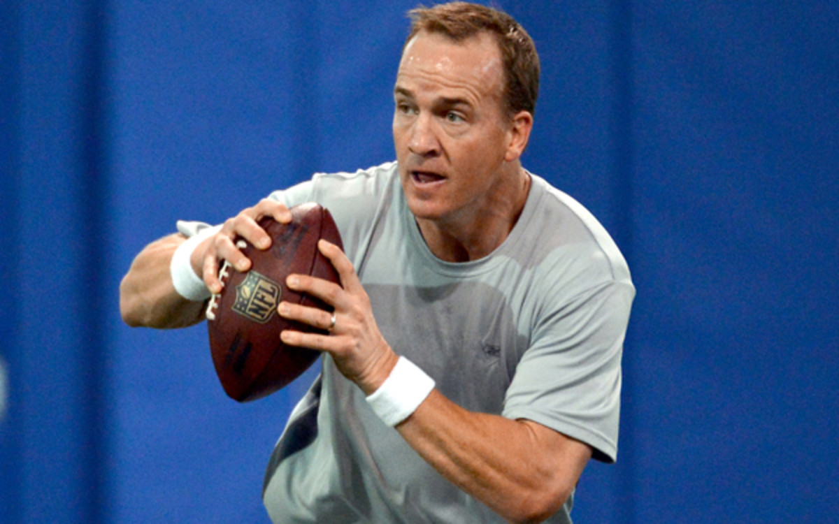 Peyton Manning worked under the tutelage of Duke head coach David Cutliffe this offseason. (Getty Images)