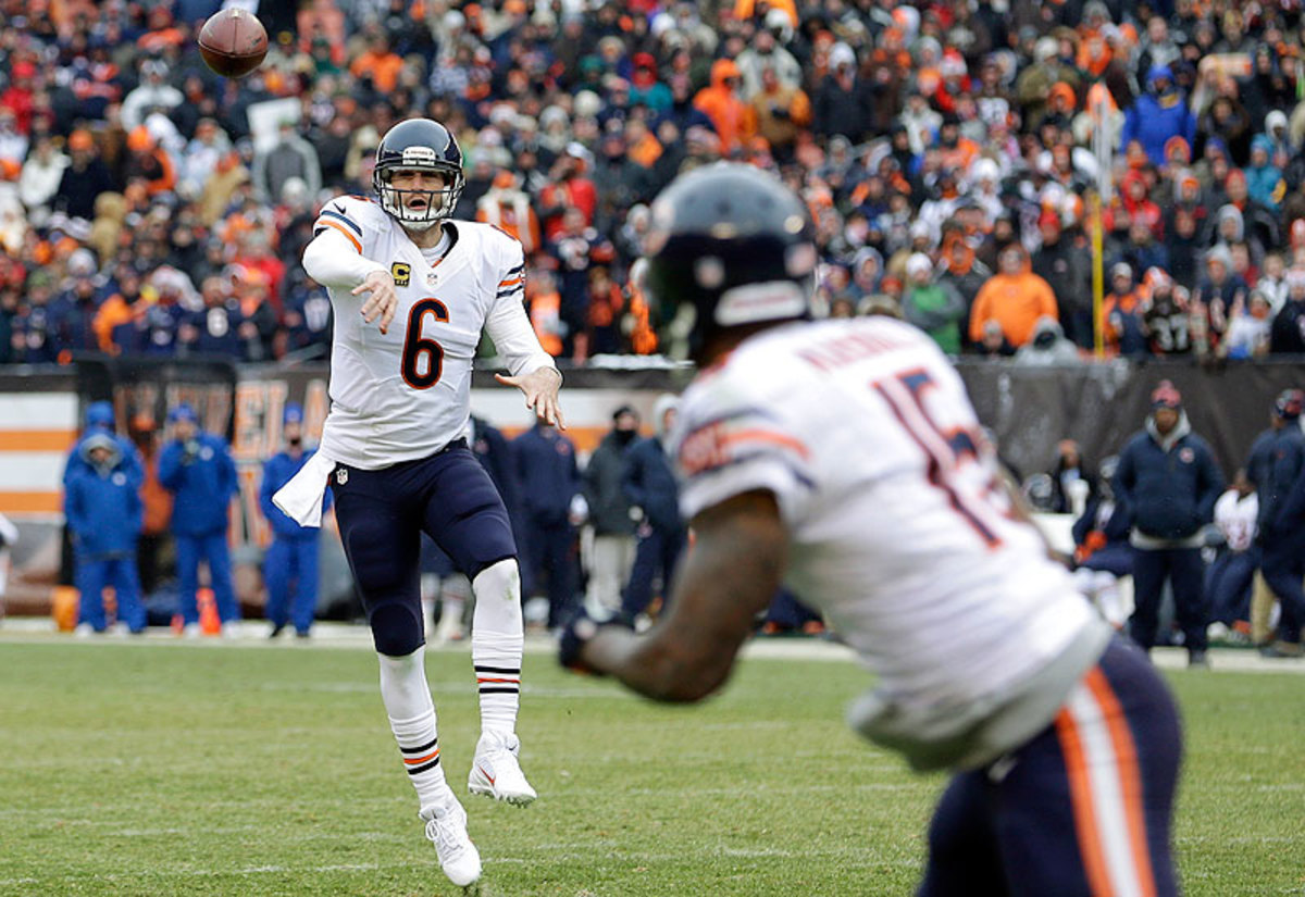 Jay Cutler returned in Week 15 after missing the previous four weeks with an ankle injury, throwing for 265 yards and three touchdowns in leading the Bears to a 38-31 win over the Browns. (Tony Dejak/AP)