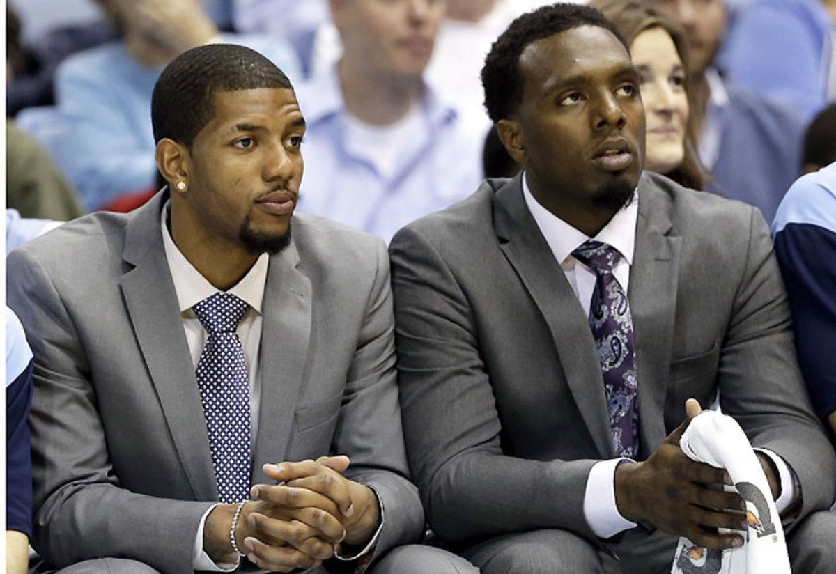 When Leslie McDonald (left) was reinstated but P.J. Hairston was not, the writing was on the wall.