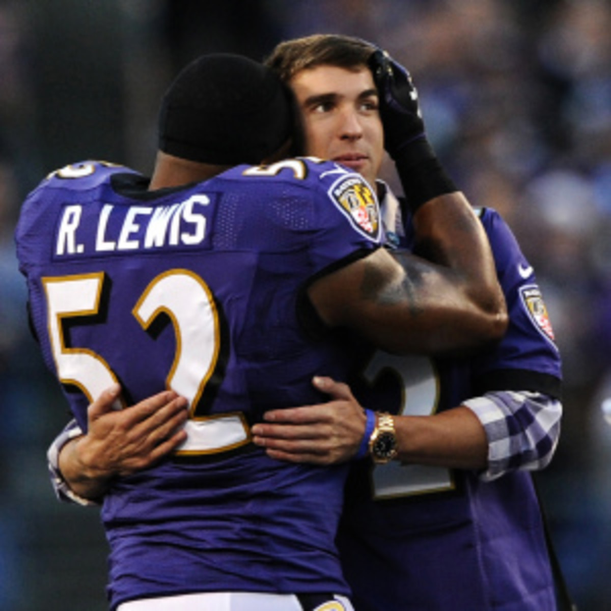 Michael Phelps and Ray Lewis have forged an unlikely friendship over the years. (Patrick Smith/Getty Images)