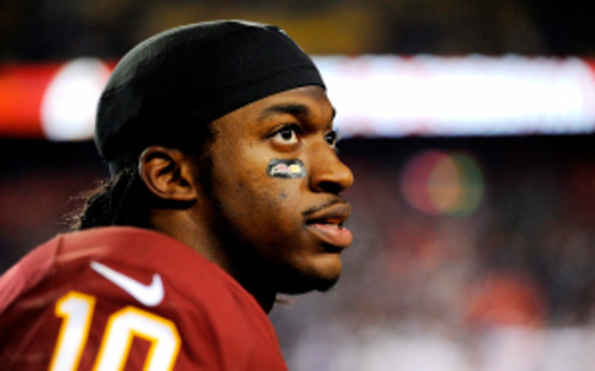 Robert Griffin III has not spoken with Redskins owner Dan Snyder about being shut down for the season. (Patrick McDermott/Getty Images)