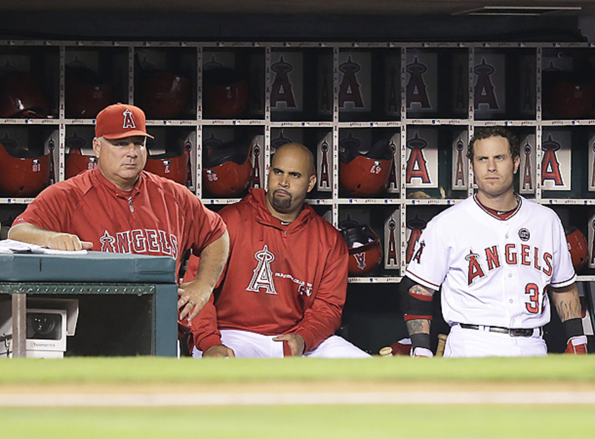 Albert Pujols is out for the remainder of the season and Josh Hamilton has underperformed. [Jae C. Hong/AP]
