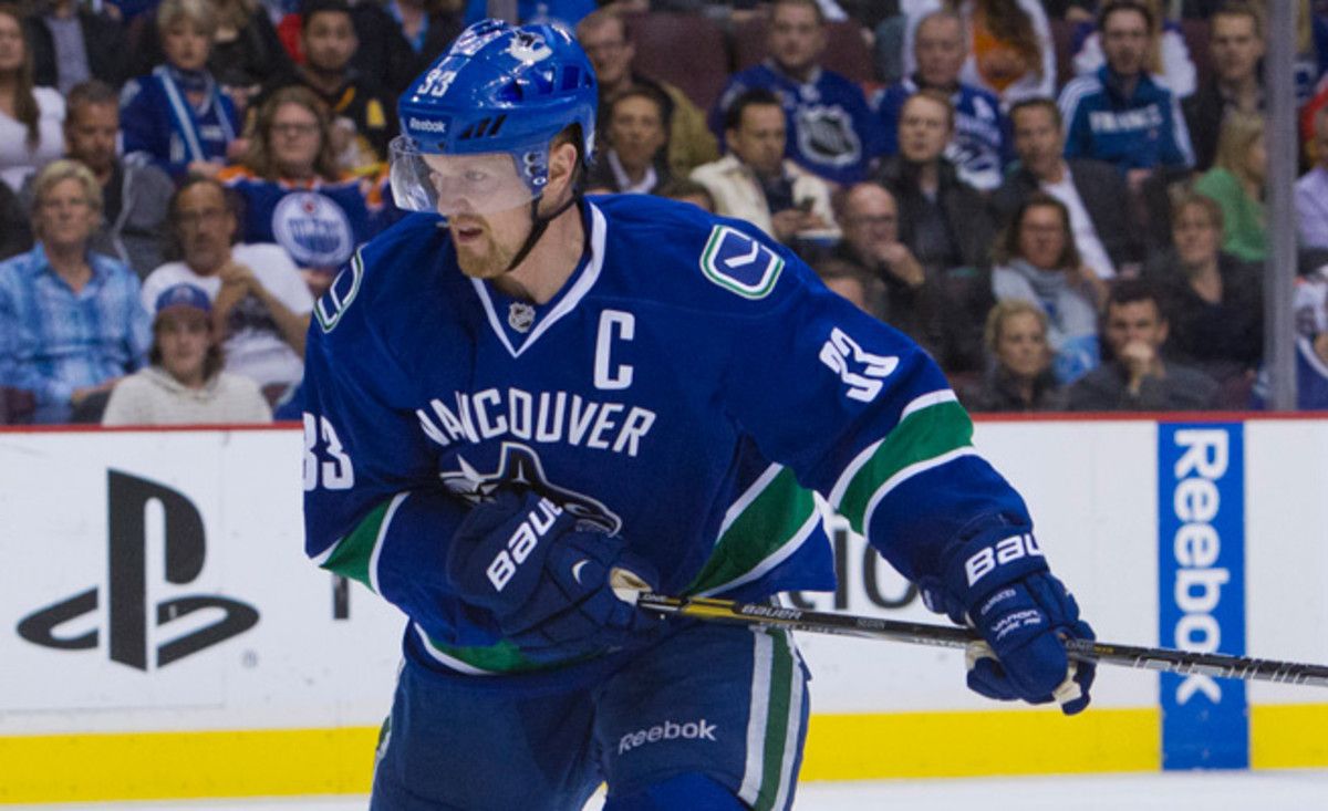 Henrik Sedin picked up two goals as the Canucks beat coach John Tortorella's old team, the Rangers.