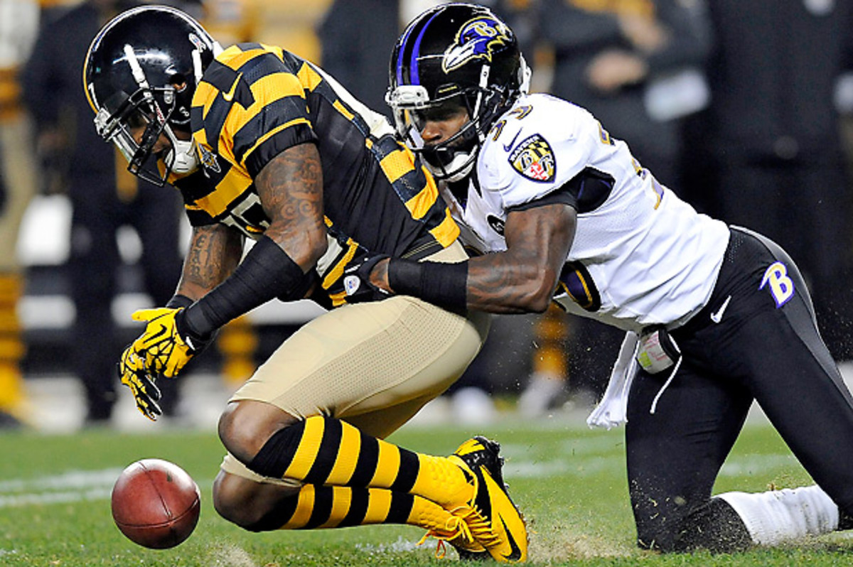 Mike Wallace began 2012 with a holdout, then had the worst season, by far, of his young career. (Don Wright/AP)
