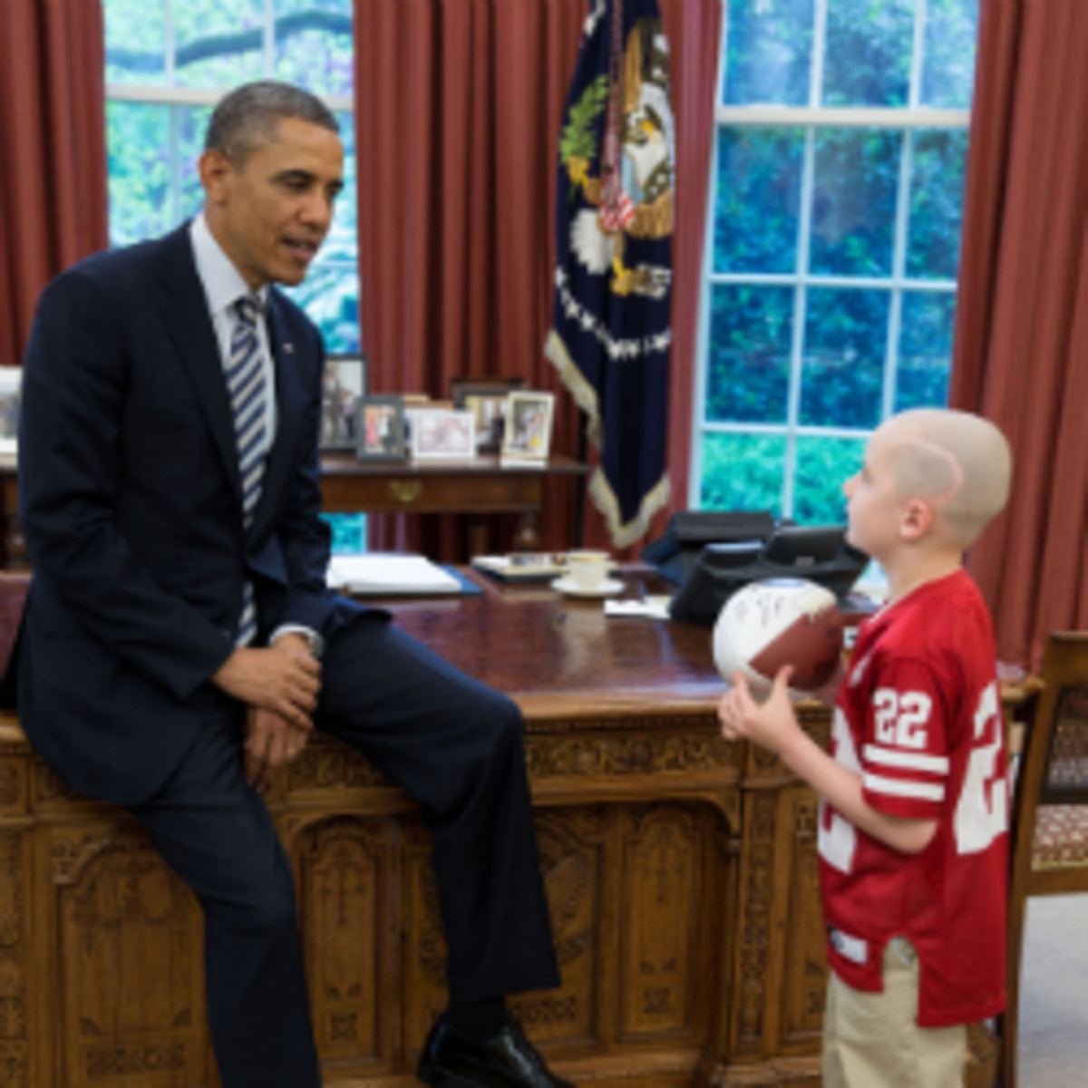 President Barack Obama met Monday with Nebraska fan and cancer patient Jack Hoffman in the White House. (Pete Souza/White House photo)