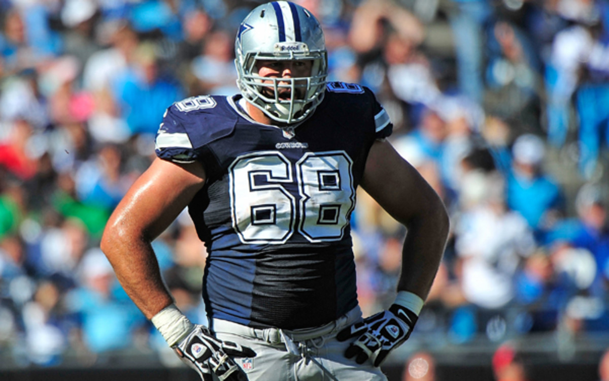A disappointing 2012 led the Cowboys to demand a pay cut from offensive tackle Doug Free. (Grant Halverson/Getty Images)