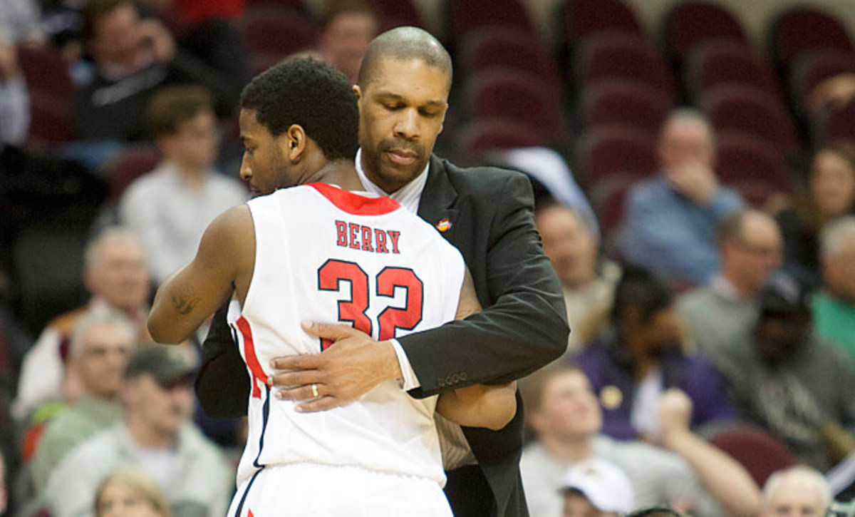 Billy Taylor hugs Ball State's Jesse Berry in what would be his last game as head coach of Ball State.