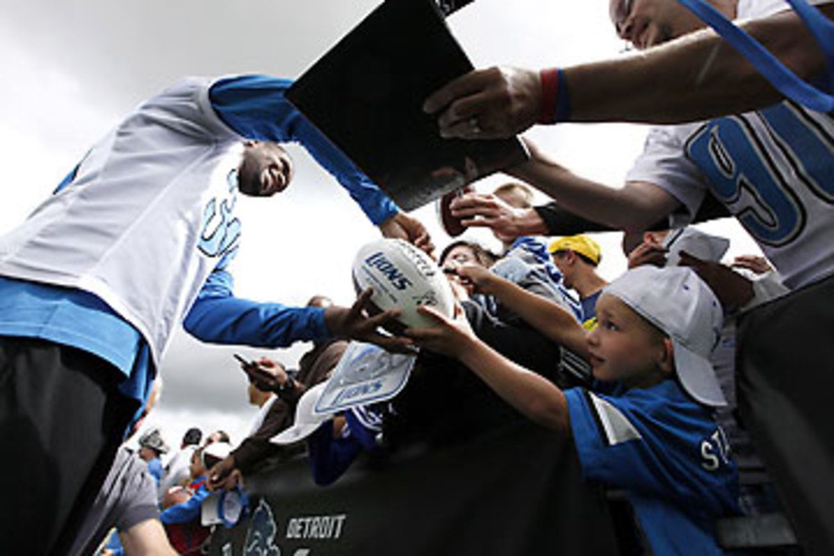 Darius Slay signs for fans at training camp. (Paul Sancya/AP)