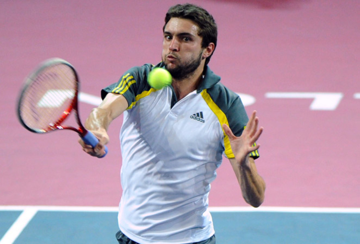 Gilles Simon broke Daniel Brands once to take the second set and wrapped up the match in 92 minutes.

