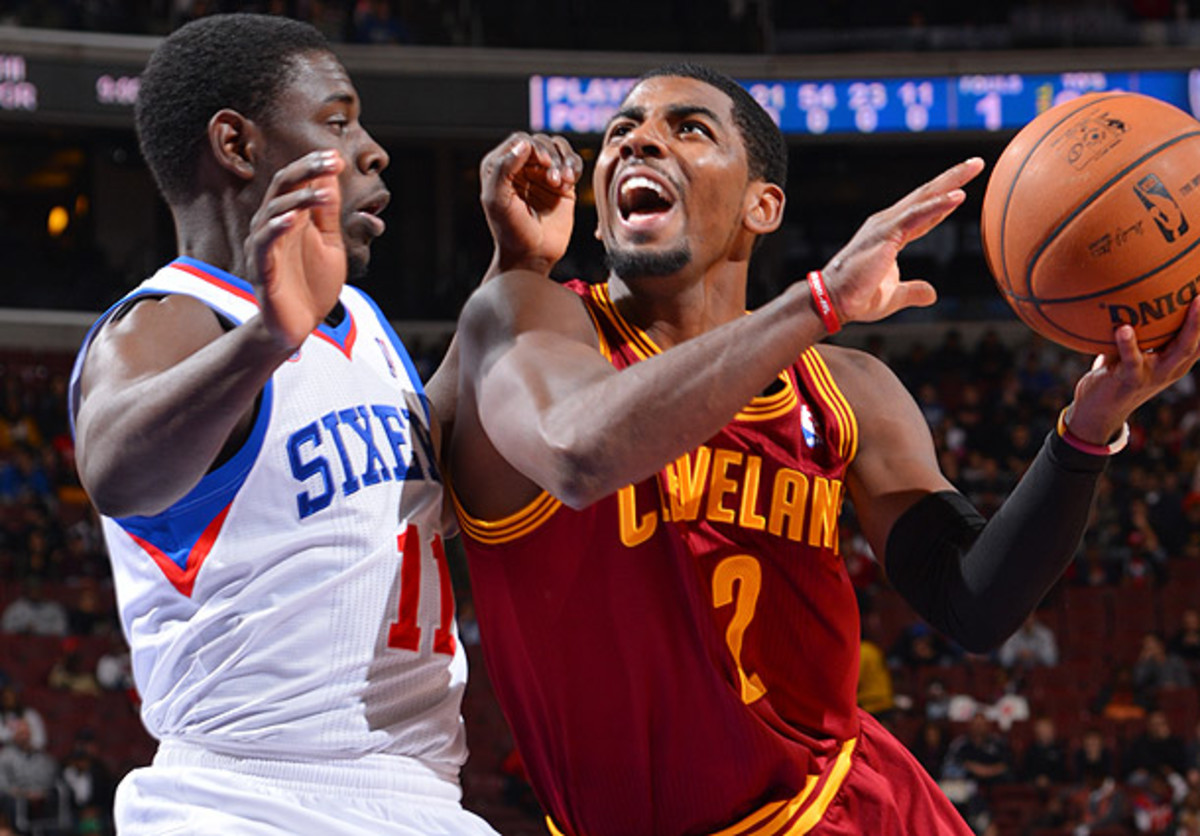 Jrue Holiday plays defense on Kyrie Irving