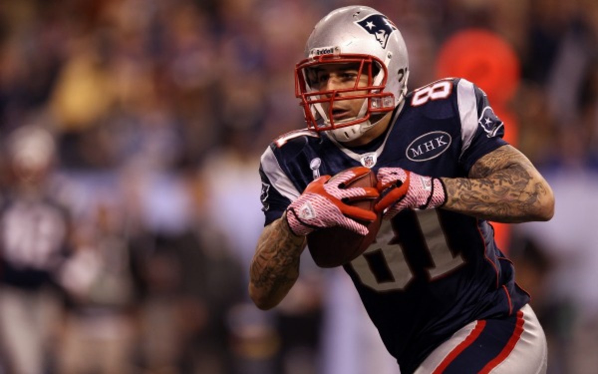 Aaron Hernandez will be removed from Madden NFL 25 and NCAA Football 14. (Ezra Shaw/Getty Images)