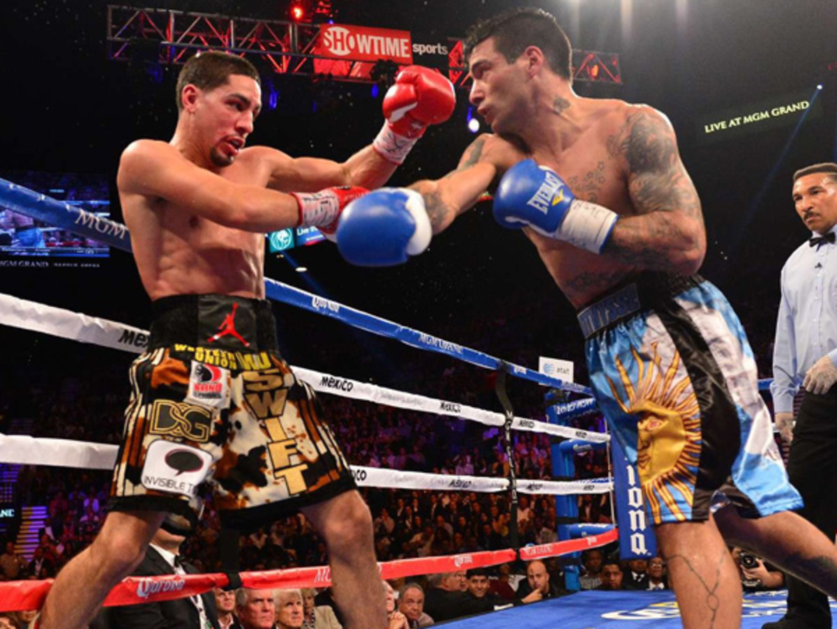 Danny Garcia was able to avoid Lucas Matthysse's heavy blows in his successful title defense. (Robert Beck/SI)