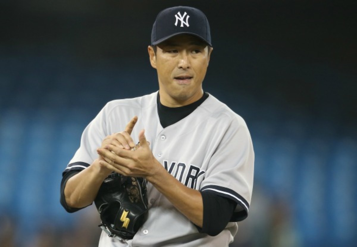 Hiroki-Kuroda was a reliable starter for the Yankees in 2013. (Tom Szczerbowski/Getty Images)