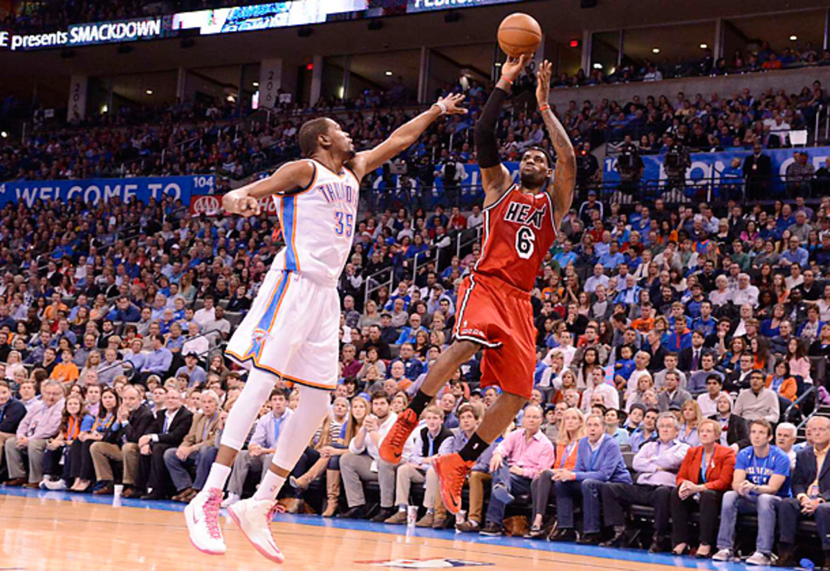 The improvements Kevin Durant has shown each season may be a factor in pushing LeBron James to completely develop his skills. (Greg Nelson/SI)