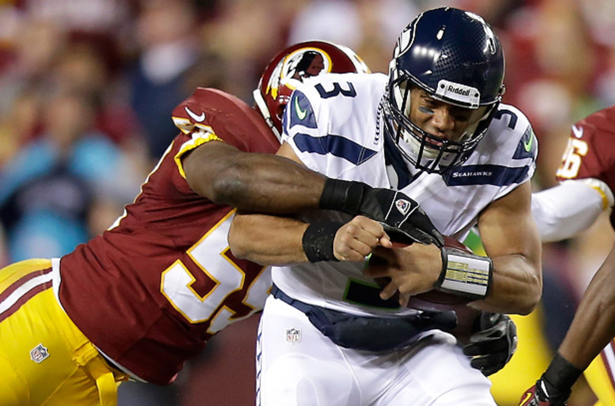 London Fletcher has played an NFL record 240 straight games. (Evan Vucci/AP)