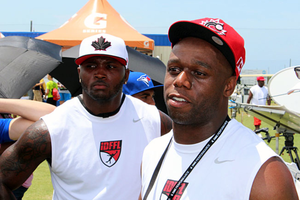 IDFFL coaches Anthony Cannon (left) and Jordan Younger help Canadian players attract recruiting buzz.