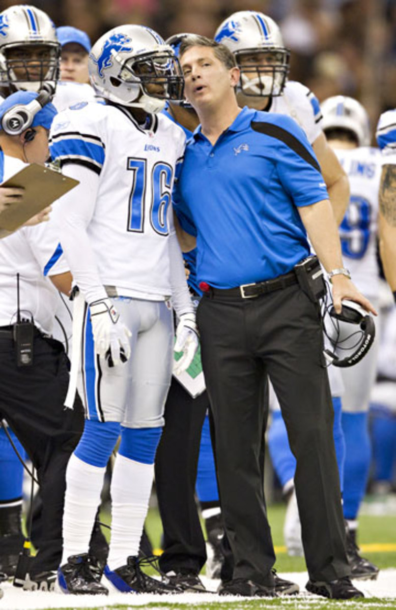 Young and coach Jim Schwartz confer on the sidelines during a 2011 game. 