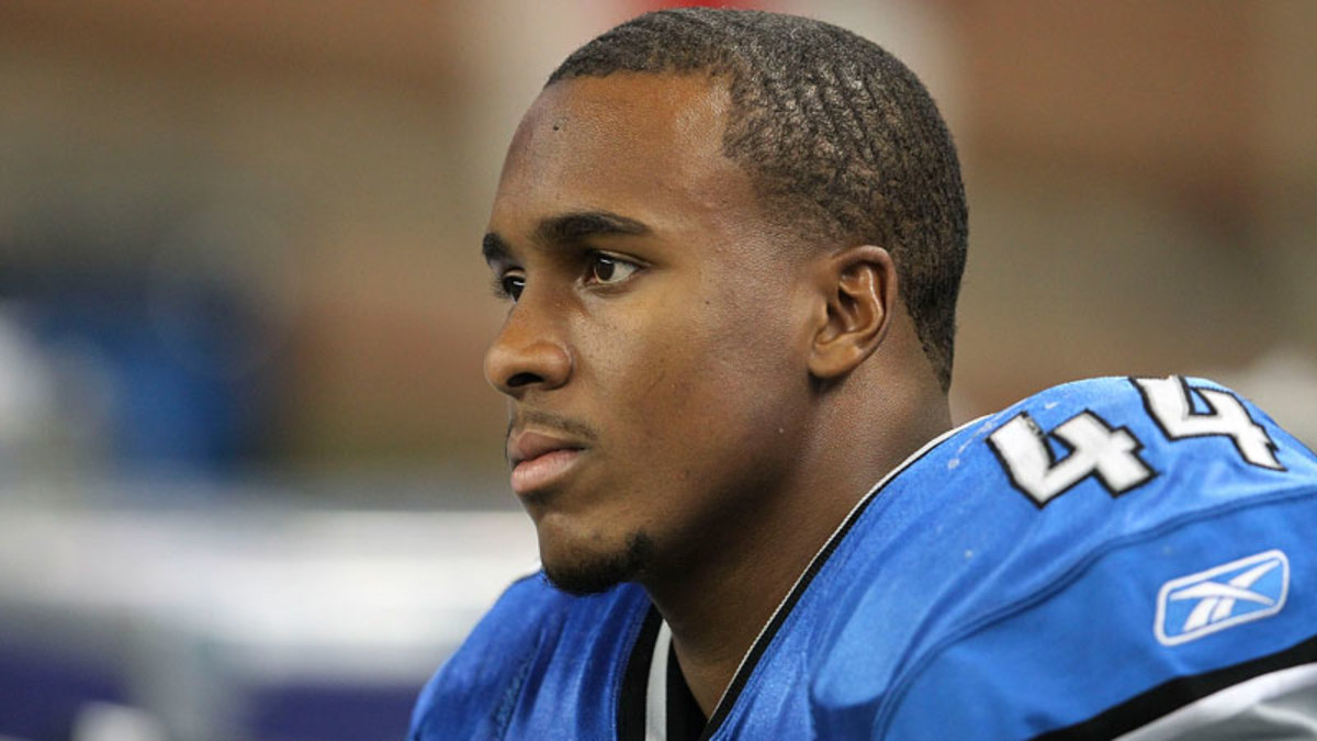 Jahvid Best sits on the sidelines of an Oct. 16, 2011, game against the 49ers. The Lions running back left the contest with a concussion and hasn't played a down since. (Leon Halip/Getty Images)