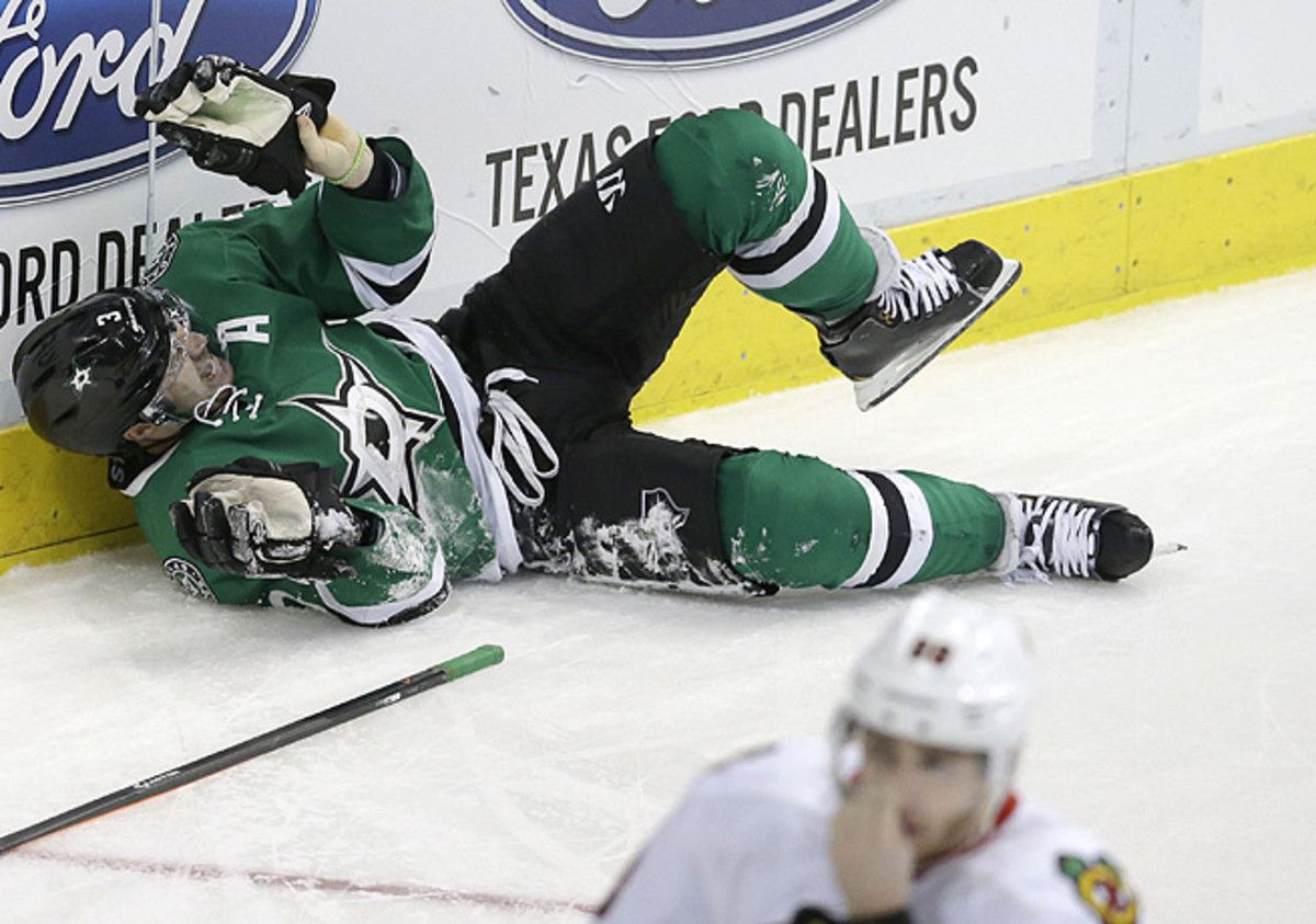 Stephane Robidas was injured when he fell awkwardly into the boards in the Stars' zone.