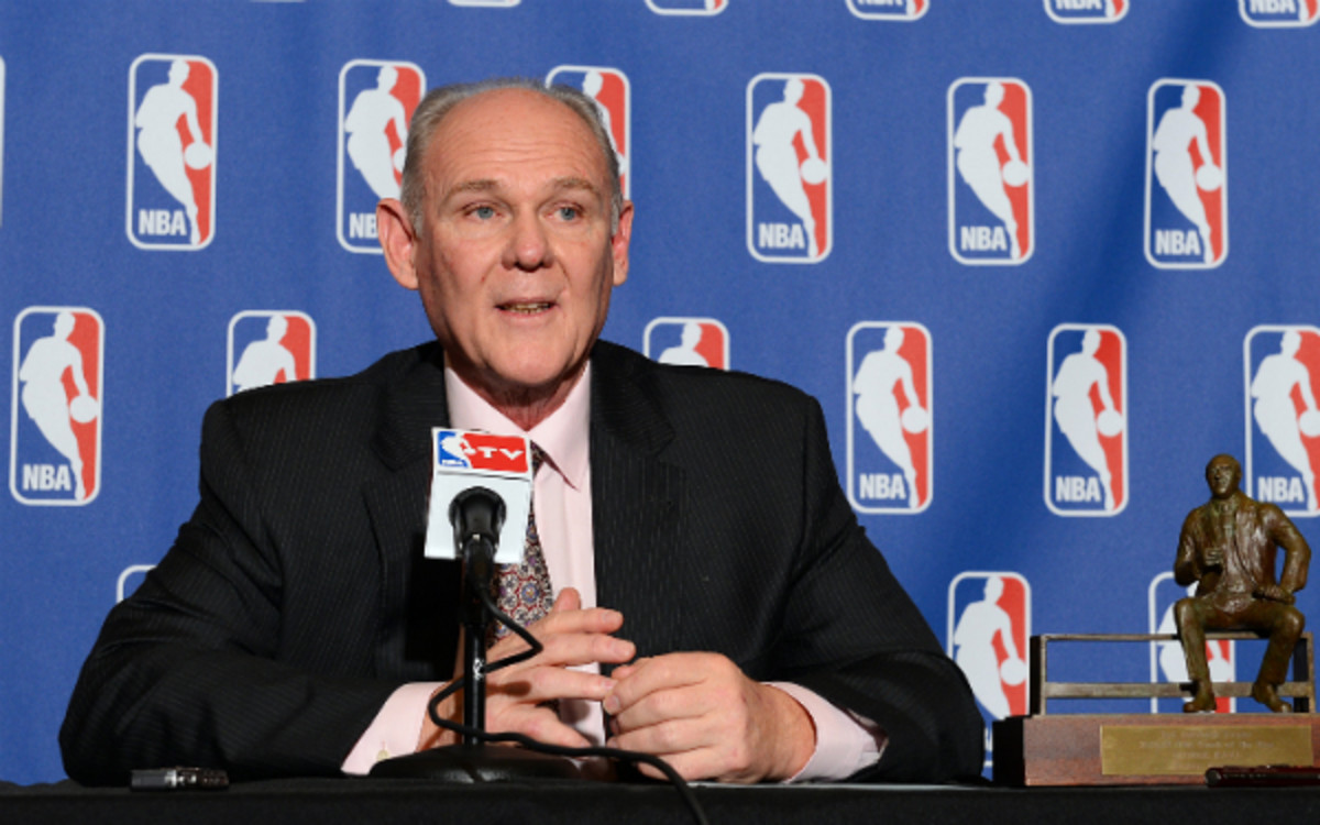 George Karl is reportedly "unsettled" about his status with the Nuggets. (Garrett Ellwood/Getty Images)