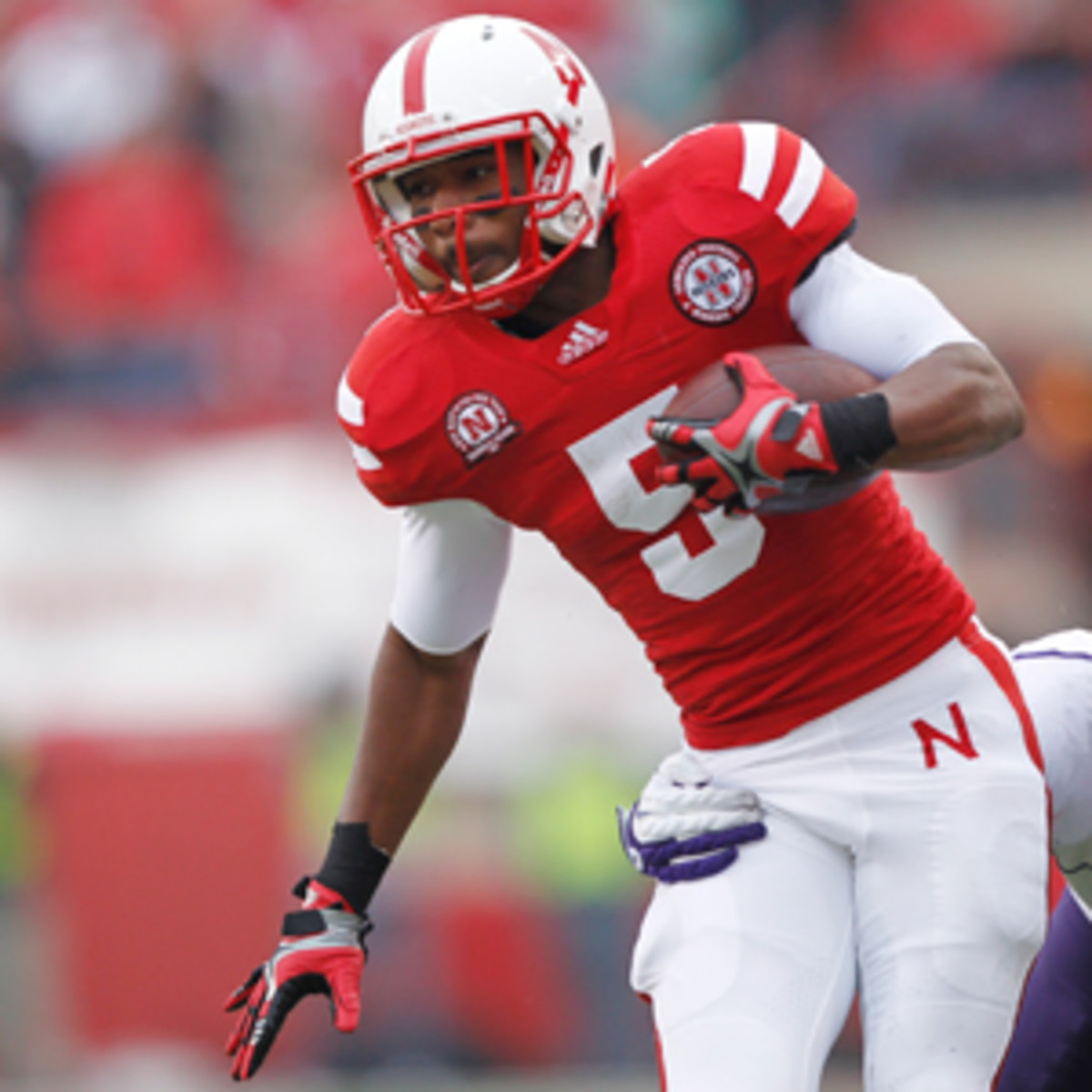 Braylon Heard and Kentucky coach Mark Stoops both attended Cardinal High School. (Joe Robbins/Getty Images)