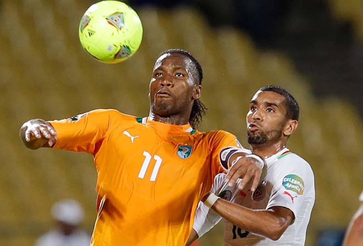 Didier Drogba (left) fights for the ball with Algeria's Kaled Lemmouchia during their African Cup of Nations group match.