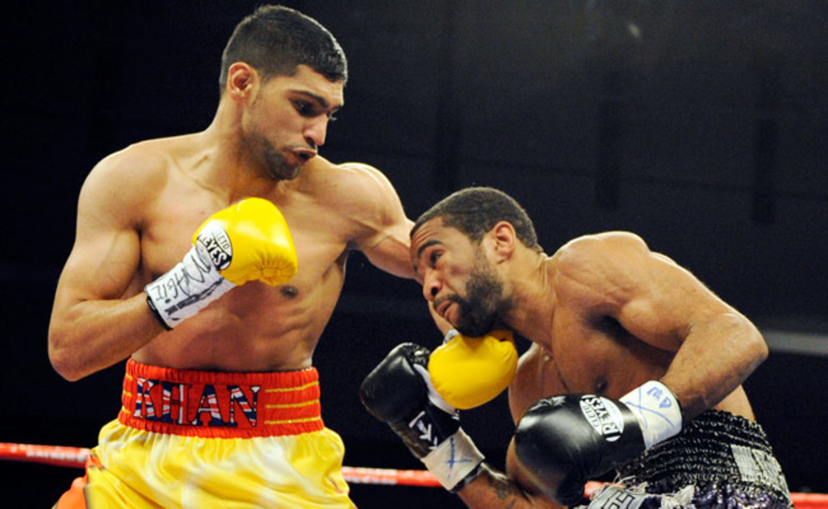 Lamont Peterson's last fight was a 12-round victory over Amir Khan (left) in December 2011.