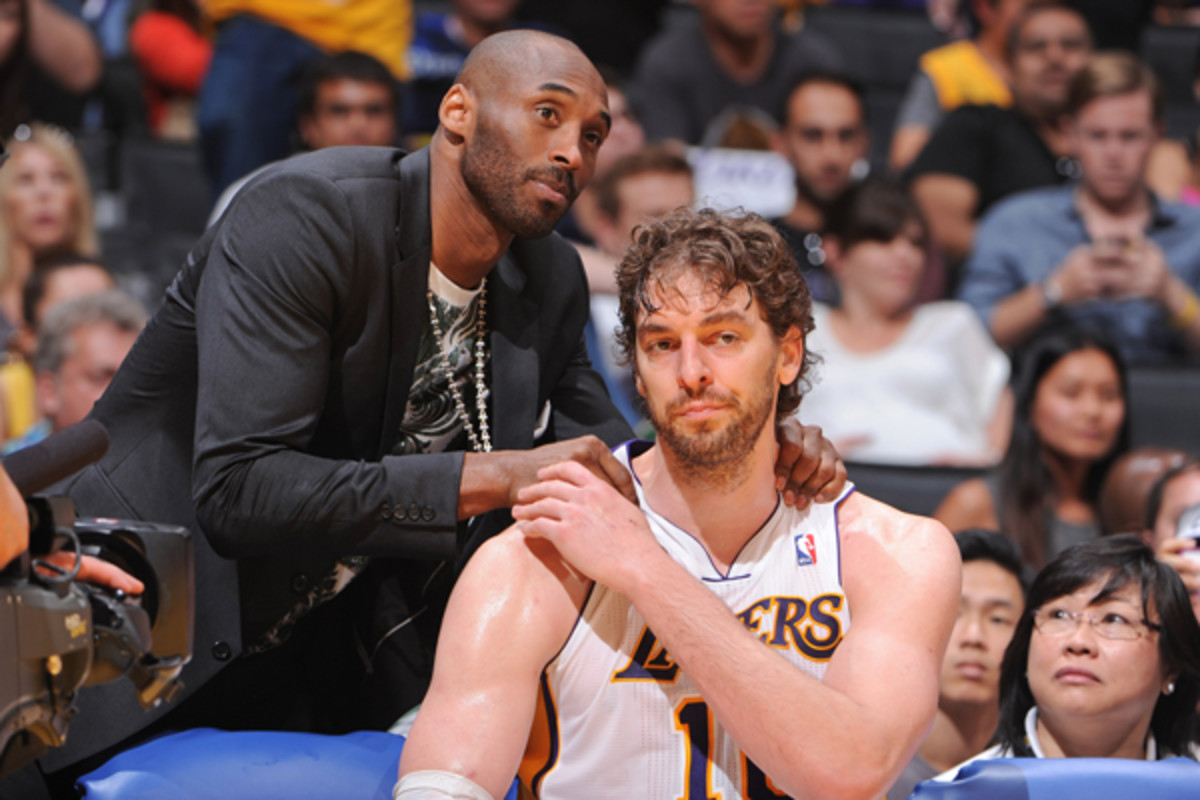 Pau Gasol [right] underwent procedures on both of his knees this week. (Andrew D. Bernstein/Getty Images)