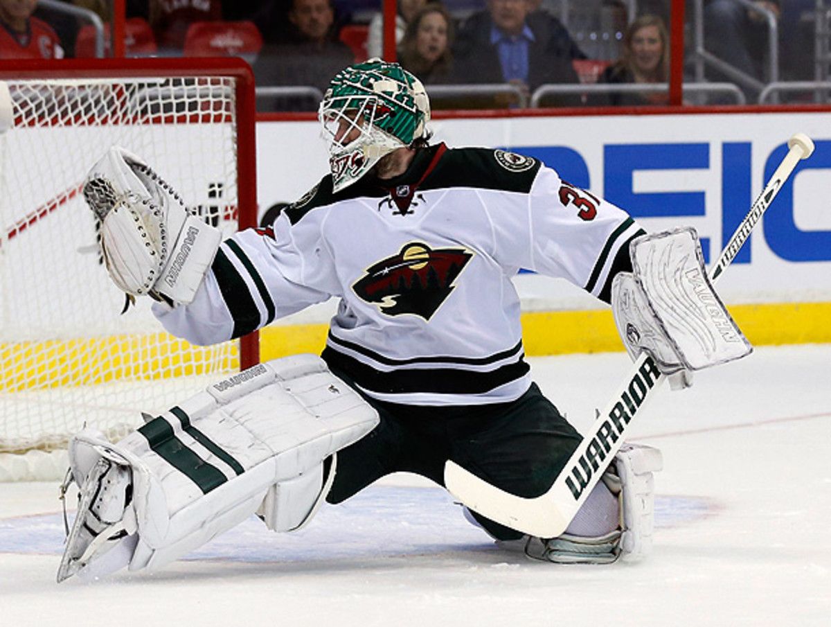 Josh Harding's play in Minnesota ought to be turning heads on Team Canada's selection committee. (Alex Brandon/AP)