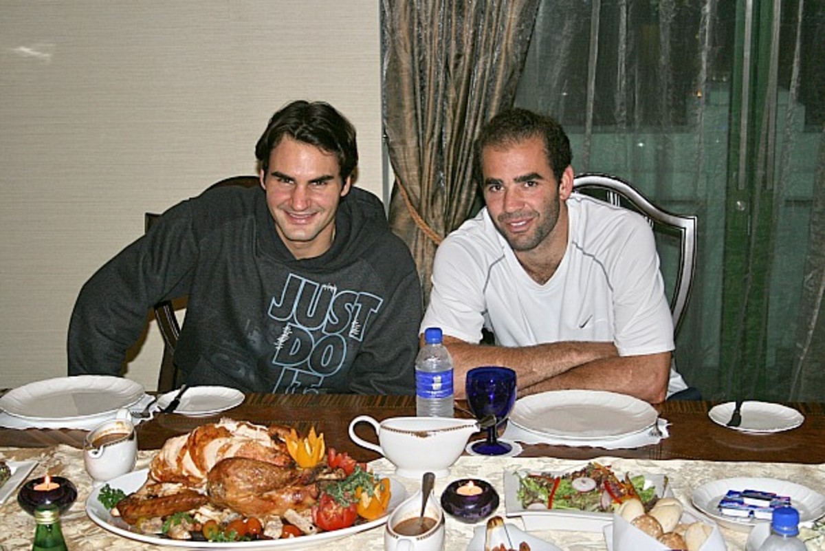 Roger Federer hosts Pete Sampras for Thanksgiving dinner in Malaysia in 2007. (Getty Images handout/Getty Images)
