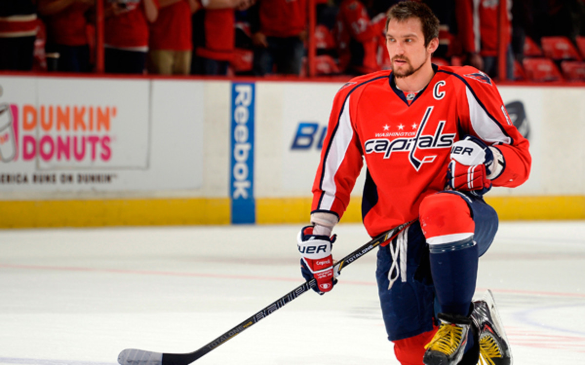 Alex Ovechkin reportedly also played in the World Championship with his a hairline fracture in his foot. (Patrick McDermott/NHL/Getty Images)