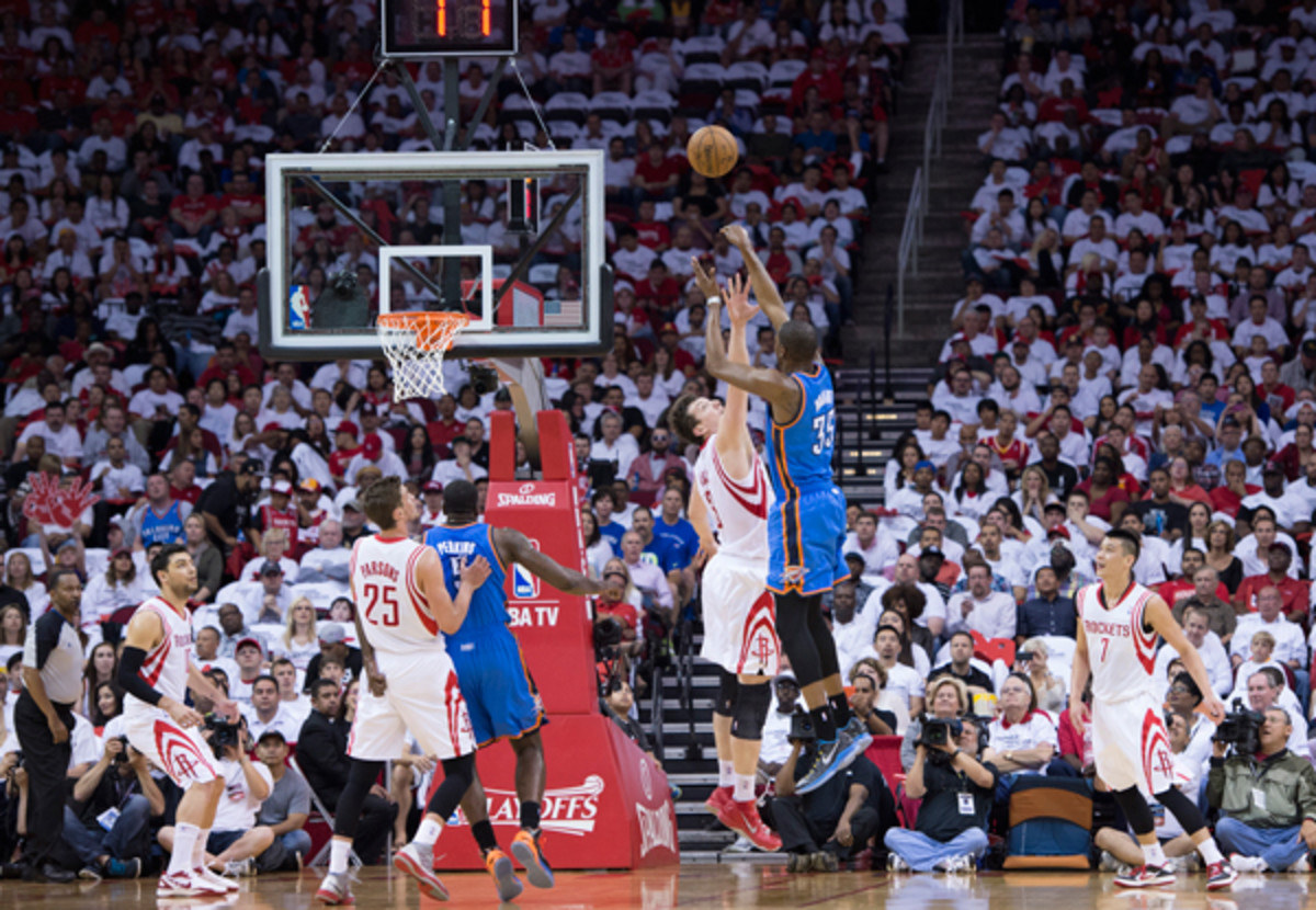 Kevin Durant pulls up for a three-pointer against the Rockets. (McClatchy-Tribune/Getty Images)