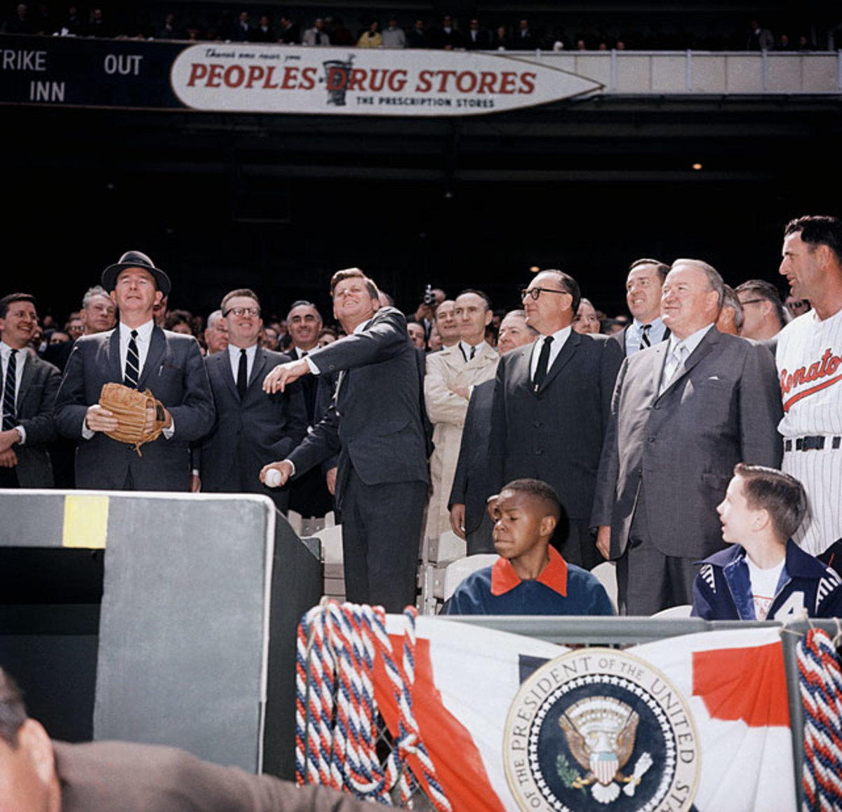 131121180938-1963-john-f-kennedy-senators-orioles-single-image-cut.jpg