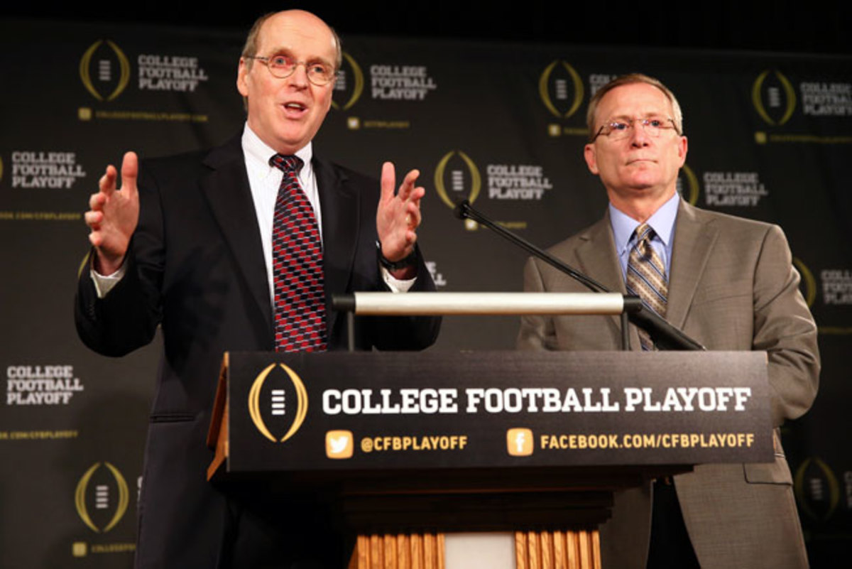 College Football Playoff executive director Bill Hancock (left) introduced Jeff Long as committee chair.